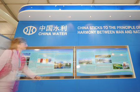 A visitor walks past the Chinese stand during a water exhibition of the Fifth World Water Forum in Istanbul of Turkey, on March 18, 2009. 