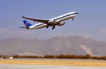 The air bus A330-300 of China Southern Airlines on its high-precision-navigation test flight takes off at the Lhasa Gonggar Airport, on March 18, 2009.