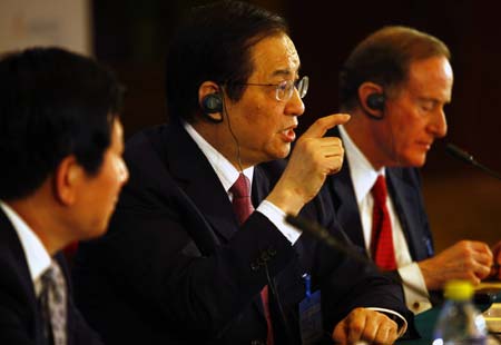 Liu Mingkang, head of the China Banking Regulatory Commission, addresses China Development Forum 2009 in Beijing, capital of China, on March 22, 2009. 