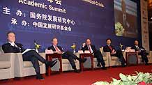 Photo taken on March 21, 2009 shows experts and guests sit on the main stage at the academic summit of China's Development and Reform in the Global Financial Crisis of China Development Forum 2009 in Beijing, capital of China. Over fifty leaders of multinational corporations, senior officials of international organizations and well-known scholars are invited to attend the 3-day forum this year which focus on the topic of China's development and reform in the global financial crisis.