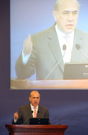 Angel Gurria, secretary-general of the Organization for Economic Cooperation and Development (OECD), addresses the China Development Forum 2009 in Beijing, capital of China, on March 23, 2009. 