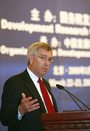 Caterpillar Chairman and CEO James Owens addresses the China Development Forum 2009 in Beijing, capital of China, on March 23, 2009. 