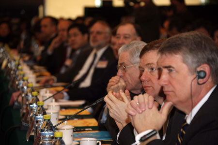 Participants listen to a speech during the China Development Forum 2009 in Beijing, capital of China, on March 23, 2009. 