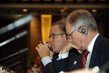 Participants listen to a speech during the China Development Forum 2009 in Beijing, capital of China, on March 23, 2009. 