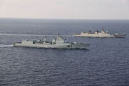 The destroyer DDG-167 Shenzhen (L) of the second group of Chinese navy escort ships and destroyer DDG-169 Wuhan of the first group sail in the Gulf of Aden on April 13, 2009. The second group of Chinese navy escort ships converged with the first group of Chinese navy escort ships in the Gulf of Aden on Monday. 