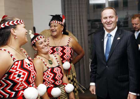 New Zealand Prime Minister John Key (R) is welcomed by the Maoris in Shanghai, China, on April 16, 2009. Key is to head to south China's Hainan Province for the 2009 meeting of the Bo'ao Forum for Asia from April 17 to 19. 