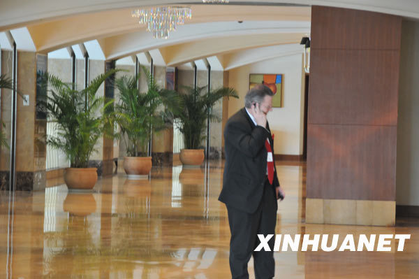 Photo taken on April 16, 2009 shows a delegate to the Boao Forum for Asia Annual Conference 2009 talks on the phone at a conference venue. This year's conference is scheduled to run from April 17 to 19 in Boao, a scenic town in south China's Hainan Province, with the theme 'Asia: Managing Beyong Crisis.' More than 1,600 delegates are expected to discuss the impact of the international financial crisis on Asia and how the region can weather these challenges as effectively as possible.