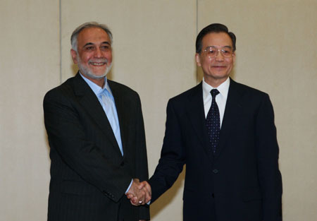 Chinese Premier Wen Jiabao (R) meets with Iran's First Vice President Parviz Davoodi in Sanya, south China's Hainan Province, on April 17, 2009. Davoodi arrived here to attend the Boao Forum for Asia (BFA) Annual Conference 2009 which would be held in Boao, a scenic town in Hainan, from April 17 to 19.
