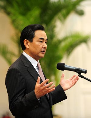 State Council Taiwan Affairs Office Director Wang Yi speaks at the welcoming cocktail party in Boao, south China's Hainan Province, on April 17, 2009. Wang Yi met here with Fredrick Chien, who led a Taiwanese delegation to the Boao Forum for Asia (BFA) Annual Conference 2009 which kicked off here on Friday.