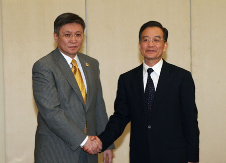 Chinese Premier Wen Jiabao (R) meets with his Mongolian counterpart Sanj Bayar in Sanya, south China's Hainan Province, April 17, 2009. Bayar arrived here to attend the Boao Forum for Asia (BFA) Annual Conference 2009 which would be held in Boao, Hainan from April 17 to 19.