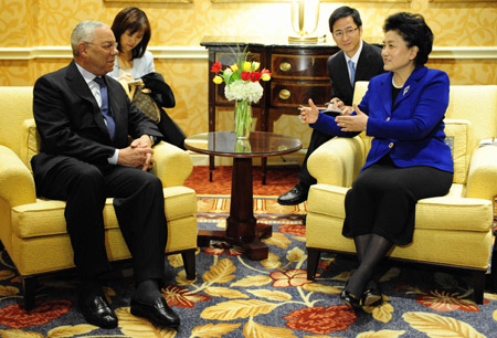 Visiting Chinese State Councilor Liu Yandong (R) meets with former U.S. Secretary of State Colin Powell in Washington on April 17, 2009. 