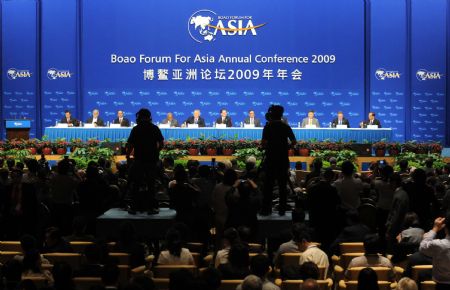 Delegates attend the opening plenary of Boao Forum for Asia (BFA) Annual Conference 2009 in Boao, a scenic town in south China's Hainan Province, on April 18, 2009. The BFA Annual Conference 2009 opened here on Saturday with the theme of 'Asia: Managing Beyond Crisis.'