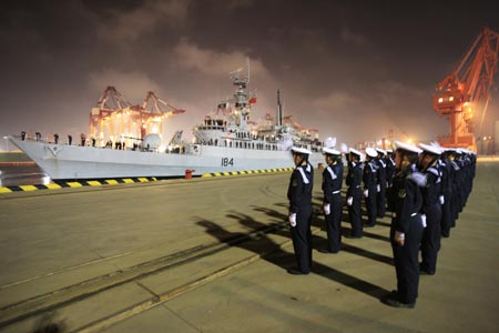 Pakistan Navy missile destroyer PNS Badr arrives in Qingdao, a port city in east China's Shandong Province late April 18, 2009, to attend an international fleet review on April 23 to celebrate the 60th anniversary of the founding of the People's Liberation Army Navy. Two Pakistani Navy ships, Badr and Nasr, arrived at Qingdao on Saturday, to observe a naval parade of about 20 Chinese warships and attend the international fleet review to be staged in the waters southeast off the city.