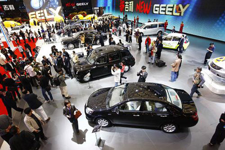 Visitors walk around at the Shanghai auto expo in Shanghai, east China, on April 20, 2009.