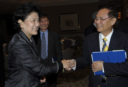 Chinese State Councilor Liu Yandong meets with Henry Tzu-Yow Yang, Chancellor of the University of California in Santa Barbara (UCSB), in San Francisco, on April 19, 2009. 