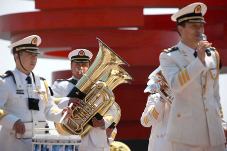Members of the military band of Chinese People's Liberation Army Navy attend a performance in Qingdao, east China's Shandong Province, on April 21, 2009.