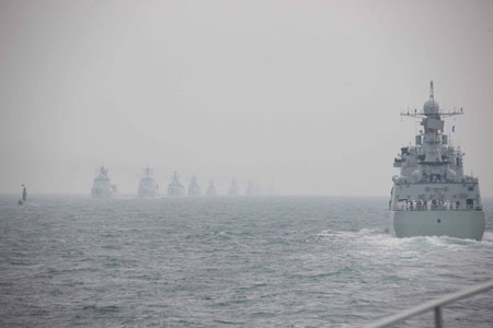 A naval parade of the Chinese People&apos;s Liberation Army (PLA) Navy warships and aircraft is held in waters off China&apos;s port city of Qingdao, east China&apos;s Shandong Province, on April 23, 2009. 