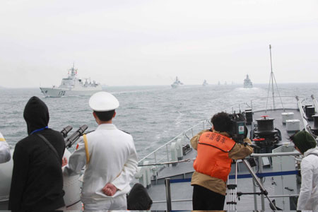A naval parade of the Chinese People&apos;s Liberation Army (PLA) Navy warships and aircraft is held in waters off China&apos;s port city of Qingdao, east China&apos;s Shandong Province, on April 23, 2009.