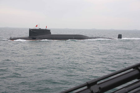A nuclear submarine of the Chinese People&apos;s Liberation Army (PLA) Navy is seen during a naval parade of the PLA Navy warships and aircraft in waters off China&apos;s port city of Qingdao, east China&apos;s Shandong Province, on April 23, 2009. 
