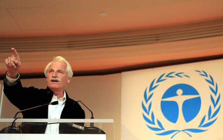 Inspiration and Action Prize bearer Yann Arthus-Bertrand, French photographer and public awareness pioneer, addresses the awarding ceremony of Champion of the Earth in Paris, on April 22, 2009.