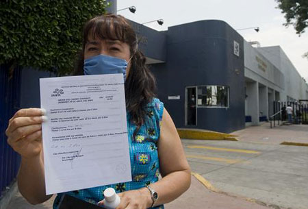 Maria, 45, is another suspect of swine flu virus A (H1N1) after the National Influenza Center in Mexico City, capital of Mexico, examined her on April 26, 2009.