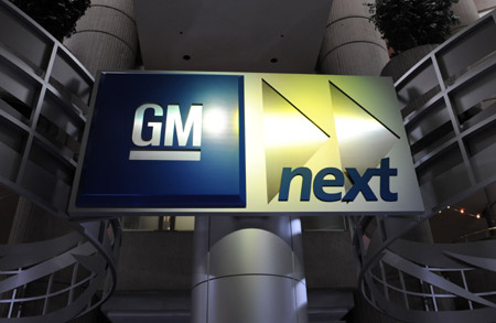 The file photo taken on April 14, 2009 shows a 'GM next' board inside the GM headquarters in Detroit, the United States.