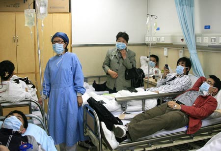 Some patients are seen at the fever diagnosis ward of Shanghai East Hospital in Shanghai, east China, on May 3, 2009. Shanghai East Hospital opened fever diagnosis ward and express way for the fever patients for preventing influenza A/H1N1.