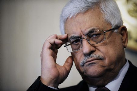 President of the Palestinian National Authority Mahmoud Abbas gestures at a press conference after his meeting with Egyptian President Hosni Mubarak in Cairo, capital of Egypt, on May 6, 2009.