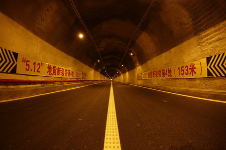 This photo taken on May 11, 2009 shows the inside of a tunnel on Yingxiu-Dujiangyan expressway which connects Yingxiu Town and Dujiangyan City, both hard-hit by last year's massive earthquake in southwest China's Sichuan Province.