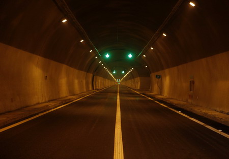 This photo taken on May 11, 2009 shows the inside of a tunnel on Yingxiu-Dujiangyan expressway which connects Yingxiu Town and Dujiangyan City, both hard-hit by last year's massive earthquake in southwest China's Sichuan Province.