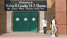 Three men walk out from the IS 5 school in Elmhurst of Queens borough of New York, the US, on May 15, 2009. Three New York City public schools in its Queens borough, IS 238 in Jamaica, PS 16 in Corona and IS 5 in Elmhurst, were closed on Friday due to reports of many children with flu-like symptoms.