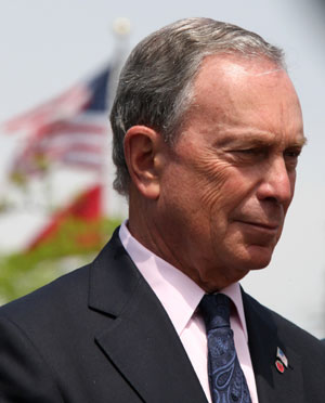 New York City Mayor Bloomberg meets with the media outside the Pop Diner restaurant in Queens borough of New York, the US, on May 15, 2009. 