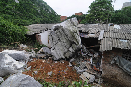 The picture taken on May 20, 2009 shows a local residece which was destroyed by rolling stones after a heavy rain hit Liuzhou City, southwest China&apos;s Guangxi Zhuang Autonomous Region. 