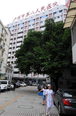 Photo taken on May 22, 2009 shows the No. 8 People's Hospital in Guangzhou, south China's Guangdong Province. The Health authorities in south China's Guangdong Province released a confirmed A/H1N1 flu-inflicted people whose surname is Yang. He is China's fourth confirmed A/H1N1 flu case till Friday.