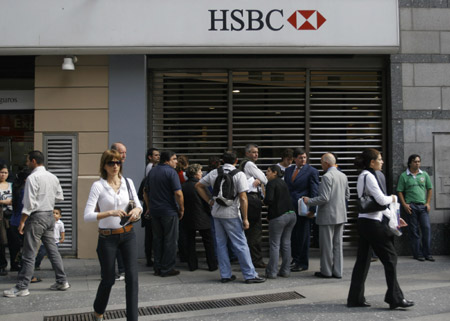 A branch of the Hong Kong and Shanghai Banking Corporation (HSBC) is closed in this photo taken on May 21, 2009, in Buenos Aires, Argentina. After the breakdown of the talk which was aimed at wage increases, the staff members of all the banks in Argentina held a nation-wide strike to protest against the management of the banks. 