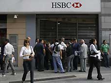 A branch of the Hong Kong and Shanghai Banking Corporation (HSBC) is closed in this photo taken on May 21, 2009, in Buenos Aires, Argentina. After the breakdown of the talk which was aimed at wage increases, the staff members of all the banks in Argentina held a nation-wide strike to protest against the management of the banks.