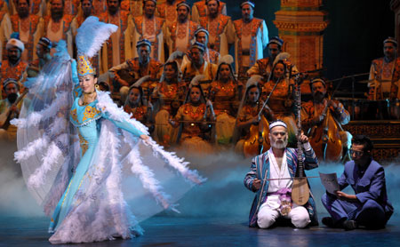 Actors perform the Uyghur Muqam in Urumqi, capital of northwest China&apos;s Xinjiang Uygur Autonomous Region, on May 27, 2009. Xinjiang Uyghur Muqam is a mixture of song, dance, folk performing art and classical music.