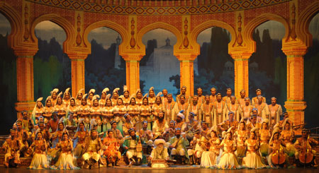 Actors perform the Uyghur Muqam in Urumqi, capital of northwest China&apos;s Xinjiang Uygur Autonomous Region, on May 27, 2009. Xinjiang Uyghur Muqam is a mixture of song, dance, folk performing art and classical music. 