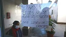 A placard showing that the relatives of patients are forbidden for visiting their deseased beloved one is pasted at the Pablo Soria Hospital in Jujuy Province, Argentina, on May 31, 2009. A 29-year-old patient died recently and he was suspected of having A/H1N1. At present, Argentina has 115 confirmed cases of A/H1N1.