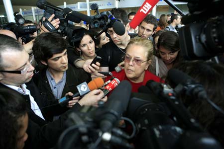 Maria Celina Rodrigues (C), consul general of Brazil in France, accepts interviews at Charles de Gaulle airport in Paris, France, on June 1, 2009. An Air France airliner with 228 people on board missing over the Atlantic Ocean was probably hit by lightning and suffered an electrics failure while flying through an Atlantic storm, Air France said on Monday.