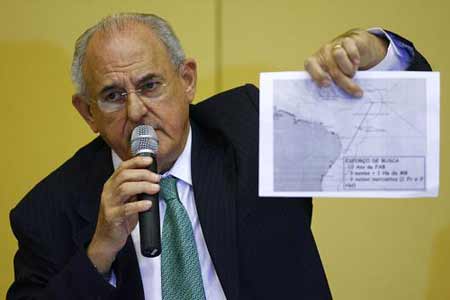 Brazilian Defense Minister Nelson Jobim holds a diagram of the crash area during a news conference in Rio de Janeiro on June 2, 2009. Jobim said that wreckage spotted in the Atlantic Ocean is 'without a doubt' from the Air France jet that disappeared en route to Paris from Rio de Janeiro with 228 people on board. 