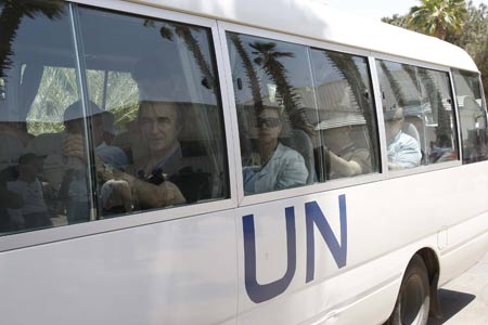 Members of EU Parliament delegation are seen on a bus in southern Gaza Strip, in June 9, 2009. A delegation of 41 European legislators entered the Gaza Strip via Egypt to inspect the war-torn territory on Tuesday. More than 1,400 Palestinians were killed in the Israeli assault on Gaza between December 27, 2008 and January 18, 2009, most of them civilians, say human rights groups.