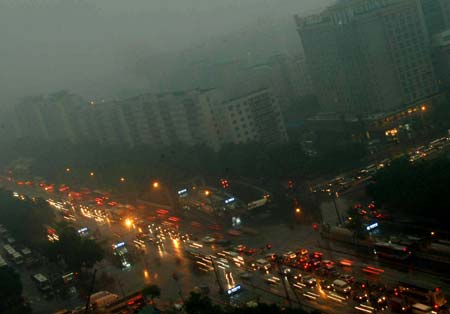 Heavy rain pours down in Beijing, China, on June 16, 2009. Local authority released a yellow alert for lightings on Tuesday. 