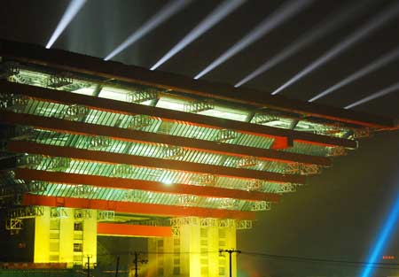 Photo taken on June 22, 2009 shows the lit-up Chinese Pavilion at the Shanghai World Expo 2010 site in Shanghai, east China. The Chinese Pavilion was lit up for trial on Monday night.