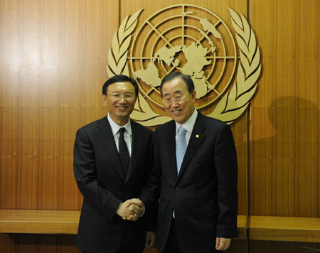 Chinese Foreign Minister Yang Jiechi met with UN Secretary-General Ban Ki-moon here Wednesday, discussing UN's role on fighting the international financial crisis.