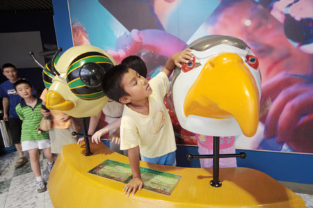 Visitors look around at the old exhibition hall of China Science and Technology Museum in Beijing, capital of China, on June 24, 2009. 
