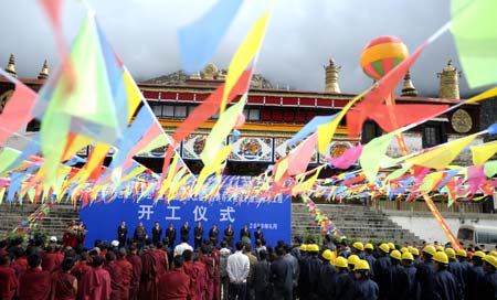 The ground-breaking ceremony of the water supply and drainage project is held at the Drepung monastery in Lhasa, southwest China's Tibet Autonomous Region, on June 25, 2009. 