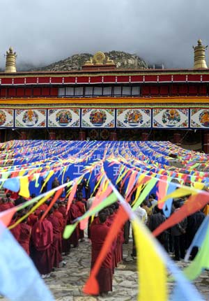 The ground-breaking ceremony of the water supply and drainage project is held at the Drepung monastery in Lhasa, southwest China's Tibet Autonomous Region, on June 25, 2009. The Chinese government invested 17.39 million yuan (RMB) on the project, which involves the construction and upgrade of water supply and drainage systems of the Drepung Monastery. Built in 1416 on the outskirts of Lhasa, the Drepung Monastery is the largest and most influential monastery of the Gelug Sect, a branch of the Tibetan Buddhism. (Xinhua/Purbu Zhaxi) 