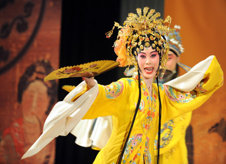 Chen Chang-yen, one of the leading Taiwanese Kunqu opera actress in youth female role of Dan, enacts in a section of the traditional repertoire Palace of the Eternal Youth, during a New Presentation of Palace's Lingering Appeal in a serial activity sponsored by the Palace Museum of Taipei to endue the traditional opera with its precious collections of curios in the Palace Museum of Taipei, southeast China's Taiwan, on July 2, 2009.