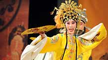 Chen Chang-yen, one of the leading Taiwanese Kunqu opera actress in youth female role of Dan, enacts in a section of the traditional repertoire Palace of the Eternal Youth, during a New Presentation of Palace's Lingering Appeal in a serial activity sponsored by the Palace Museum of Taipei to endue the traditional opera with its precious collections of curios in the Palace Museum of Taipei, southeast China's Taiwan, on July 2, 2009.